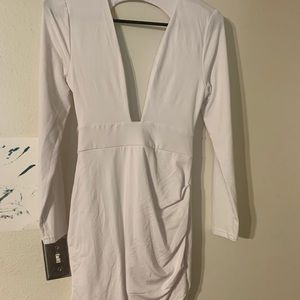 White Open back low cut body con dress